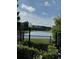 Scenic lake view with mature trees, viewed from the community area at 5152 Conroy Rd # 1333, Orlando, FL 32811