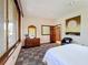 Queen bedroom with a window, recessed lights, and a closet at 6 Palm Way, Haines City, FL 33844