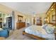 Large main bedroom features neutral walls, recessed ceiling lights and a seating area at 651 Glendora Rd, Kissimmee, FL 34759