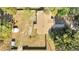 Overhead aerial view of the home, yard, fence line, and neighborhood at 7904 Empire Ave, Orlando, FL 32810