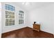 Small bedroom boasting abundant natural light and hardwood floors at 816 Garden Glen Loop, Lake Mary, FL 32746