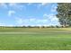 Scenic view of the meticulously maintained golf course and community at 8946 Azalea Sands Ln # 8946, Davenport, FL 33896