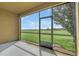 The screened-in lanai offers views of lush green fairways and beautiful landscaping at 8946 Azalea Sands Ln # 8946, Davenport, FL 33896