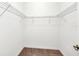 A well-organized walk-in closet with wire shelving offers ample storage at 8946 Azalea Sands Ln # 8946, Davenport, FL 33896