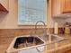 Close-up of the kitchen sink, featuring modern fixtures and ample countertop space at 9000 Us Highway 192 # 896, Clermont, FL 34714