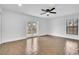 Bedroom featuring ceiling fan and sliding glass doors to the backyard at 1020 Hobson St, Longwood, FL 32750