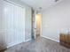 A carpeted bedroom with a closet and a box at 1042 Heirloom Dr, Haines City, FL 33844