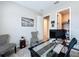 Cozy home office with neutral tones, practical furniture, and closet at 1042 Heirloom Dr, Haines City, FL 33844