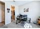 Bright home office with a glass desk and ample space at 1042 Heirloom Dr, Haines City, FL 33844