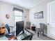 Functional home office with ample natural light and comfortable seating at 1042 Heirloom Dr, Haines City, FL 33844