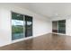 Balcony with sliding doors and outdoor views at 1062 Hidden Dr, Lakeland, FL 33809