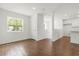 Living space with wood-look tile flooring at 1062 Hidden Dr, Lakeland, FL 33809