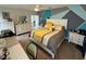 Spacious bedroom with ample natural light, ceiling fan, and a serene atmosphere for restful nights at 112 Lake Tracy Ct, Haines City, FL 33844