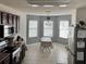 Bright eat-in kitchen with tiled floor, with natural light and space for casual dining at 112 Lake Tracy Ct, Haines City, FL 33844