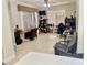 Versatile living space with tile floors, a ceiling fan, and ample natural light at 1137 Cherry Valley Way, Orlando, FL 32828