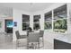 Bright breakfast nook with views of the pool and backyard at 12177 Gray Birch Cir, Orlando, FL 32832