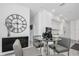 Bright dining area with modern furniture and a sleek design, open to kitchen at 12177 Gray Birch Cir, Orlando, FL 32832
