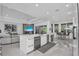 Open concept kitchen with a large island, stainless steel appliances, and sleek cabinetry at 12177 Gray Birch Cir, Orlando, FL 32832