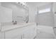 A bathroom with double vanity sinks, a large mirror, and a shower and bathtub at 1252 Ash Tree Cv, Casselberry, FL 32707