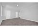 This bedroom features neutral walls, carpet, and a walk in closet at 1252 Ash Tree Cv, Casselberry, FL 32707