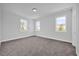 Comfortable bedroom with soft carpet, lots of light from three windows at 1252 Ash Tree Cv, Casselberry, FL 32707
