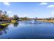 Beautiful pond with a fountain feature adds to the serene atmosphere of the community at 1252 Ash Tree Cv, Casselberry, FL 32707