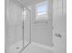 This modern bathroom features a glass enclosed walk-in shower at 1252 Ash Tree Cv, Casselberry, FL 32707