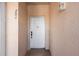 A white front door with the number 204, inviting entry to this lovely condo unit at 13829 Timberland Dr # 204, Orlando, FL 32824