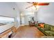The living room features an open layout, carpeted floors, and flows into the dining area at 13829 Timberland Dr # 204, Orlando, FL 32824