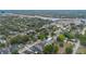 Aerial view showing a mix of residential homes, green spaces, and proximity to nearby commercial buildings at 1545 Indiana Ave # B, Winter Park, FL 32789