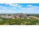 A scenic view of the city skyline, lush greenery, and the surrounding urban landscape from above at 1545 Indiana Ave # B, Winter Park, FL 32789