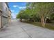Long driveway leading to the 3-car garage and backyard at 1545 Indiana Ave # B, Winter Park, FL 32789