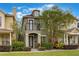 Charming two-story home with a balcony, manicured landscaping, and a welcoming front entrance at 1545 Indiana Ave # B, Winter Park, FL 32789