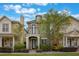 Charming two-story home with a balcony, manicured landscaping, and a welcoming front entrance at 1545 Indiana Ave # B, Winter Park, FL 32789