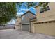 Exterior view showing 3-car garage with long driveway at 1545 Indiana Ave # B, Winter Park, FL 32789