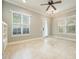 Bright living room with tile floors, ceiling fan and natural light flooding through the windows at 1545 Indiana Ave # B, Winter Park, FL 32789