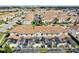 Aerial view of community highlights pools, and meticulously maintained landscaping at 1554 Plunker Dr, Davenport, FL 33896
