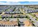 An aerial view showcases a large residential community with a prominent location marker, suggesting a point of interest at 1554 Plunker Dr, Davenport, FL 33896