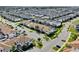 A high aerial view of a large planned residential community in Florida featuring many similar-looking houses at 1554 Plunker Dr, Davenport, FL 33896