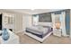 Relaxing main bedroom boasts natural light, neutral tones, and a calming ambiance for restful nights at 1554 Plunker Dr, Davenport, FL 33896
