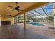 View of the covered lanai area and screened in pool of this house at 1672 Wingspan Way, Winter Springs, FL 32708