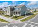 Corner lot townhome with landscaping, well maintained lawn, and a covered porch at 1860 Tohoqua Blvd, Kissimmee, FL 34744