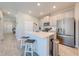 Bright kitchen with a large island and stainless steel appliances at 1860 Tohoqua Blvd, Kissimmee, FL 34744