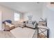 Comfortable living room featuring a neutral sofa, white rug, and stylish decor at 1860 Tohoqua Blvd, Kissimmee, FL 34744