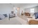 Open-concept living area connecting the living and dining spaces, ideal for entertaining at 1860 Tohoqua Blvd, Kissimmee, FL 34744