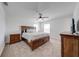 Spacious main bedroom with a ceiling fan, carpet and bright natural light at 1860 Tohoqua Blvd, Kissimmee, FL 34744