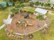 Community playground with slides and climbing equipment provides a fun recreational area for  at 1860 Tohoqua Blvd, Kissimmee, FL 34744