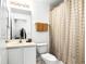 Cozy bathroom featuring shower-tub combo, neutral colors, and vanity at 240 Minniehaha Cir, Haines City, FL 33844