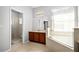 Bathroom featuring a soaking tub and a separate walk-in shower with glass door at 240 Minniehaha Cir, Haines City, FL 33844