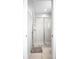 Modern bathroom with a walk-in shower and glass door at 240 Minniehaha Cir, Haines City, FL 33844